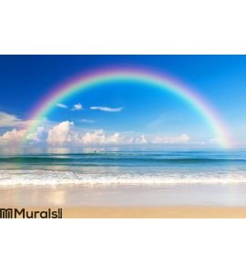 Beautiful sea with a rainbow in the sky Wall Mural
